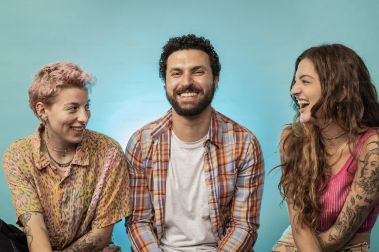three friends laughing together